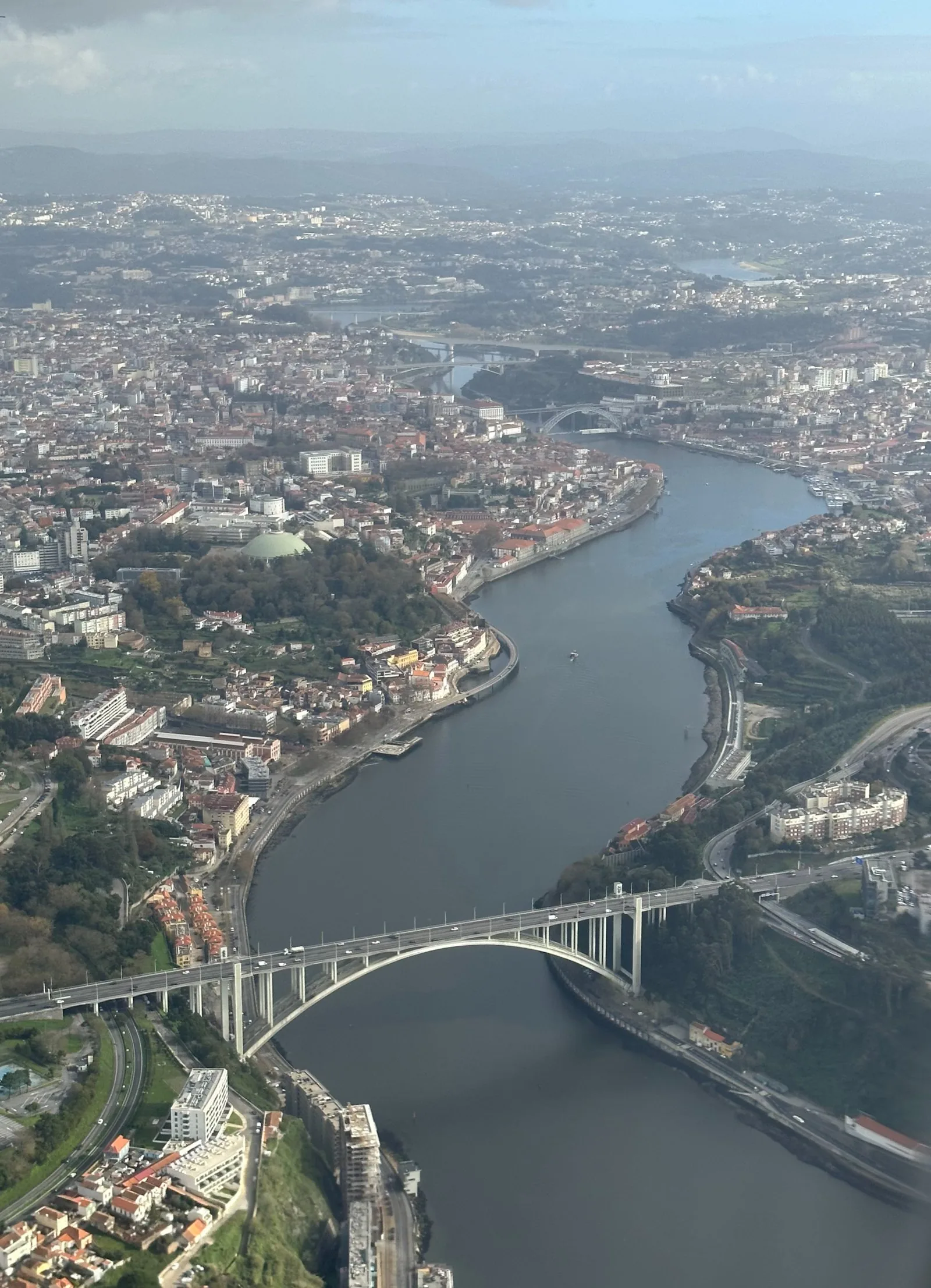 Aerial view of Porto and the river Douro with the Arrábida Bridge.