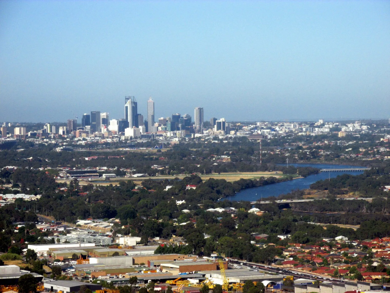 Aerial view across Ascot toward the Perth skyline and Swan River, Western Australia.