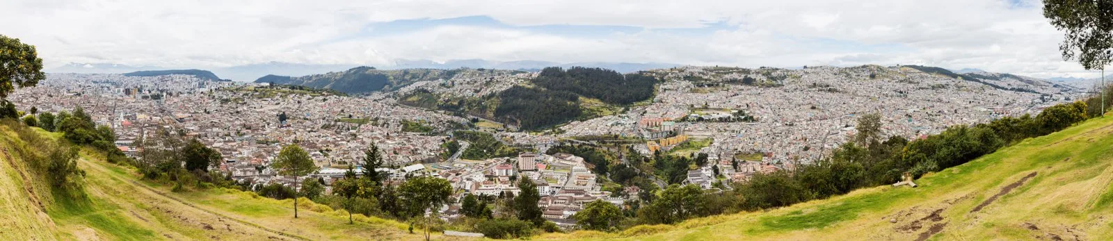 Panoramic view of Quito from El Panecillo, showing the city stretched along the Andean valley.