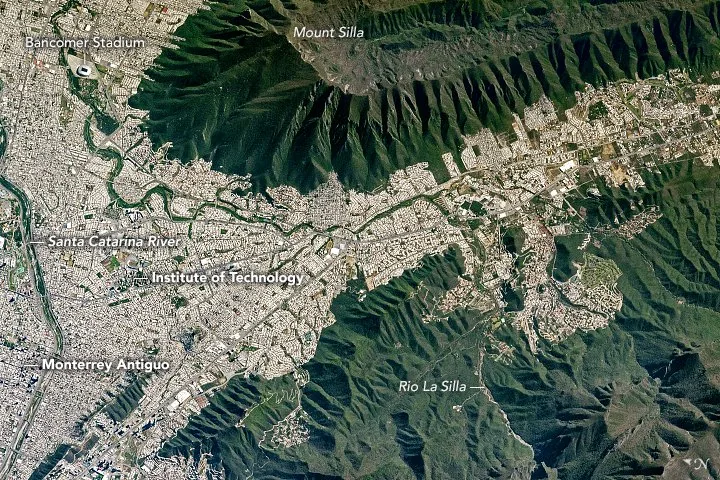 Aerial view of Cerro de la Silla over Monterrey, near the Rio La Silla