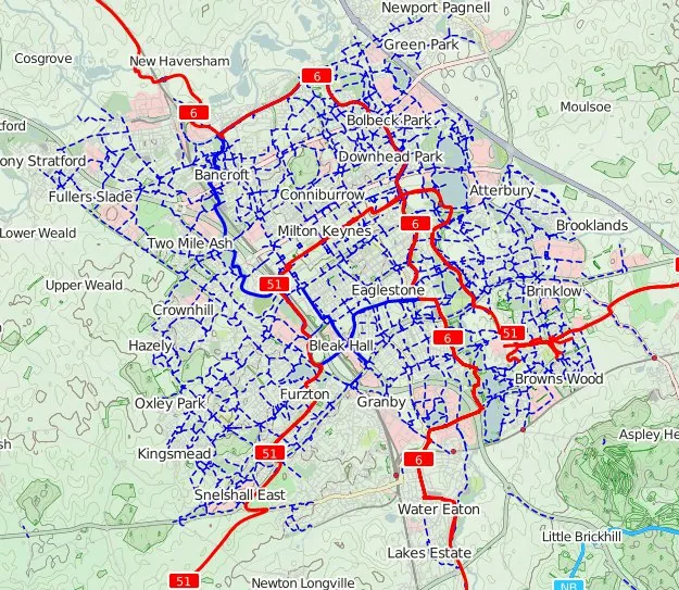 City-wide network map of Milton Keynes tracing the defining 1 km orthogonal grid of main roads (overlaid with the Redway path network) that structures the whole new town. Best available free image of 