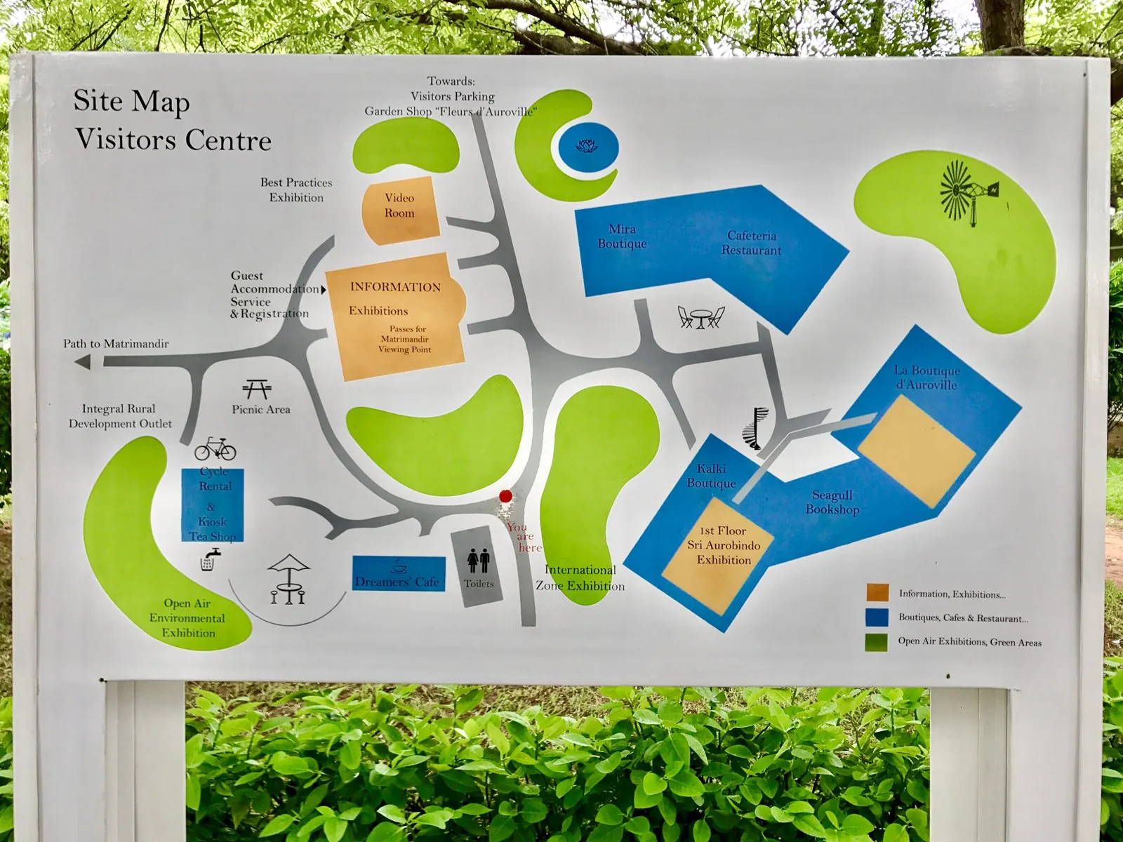 The official Auroville township map showing the planned galaxy-form layout: the central Matrimandir, the radiating Lines of Force, the four city zones and the surrounding green belt of Roger Anger's G